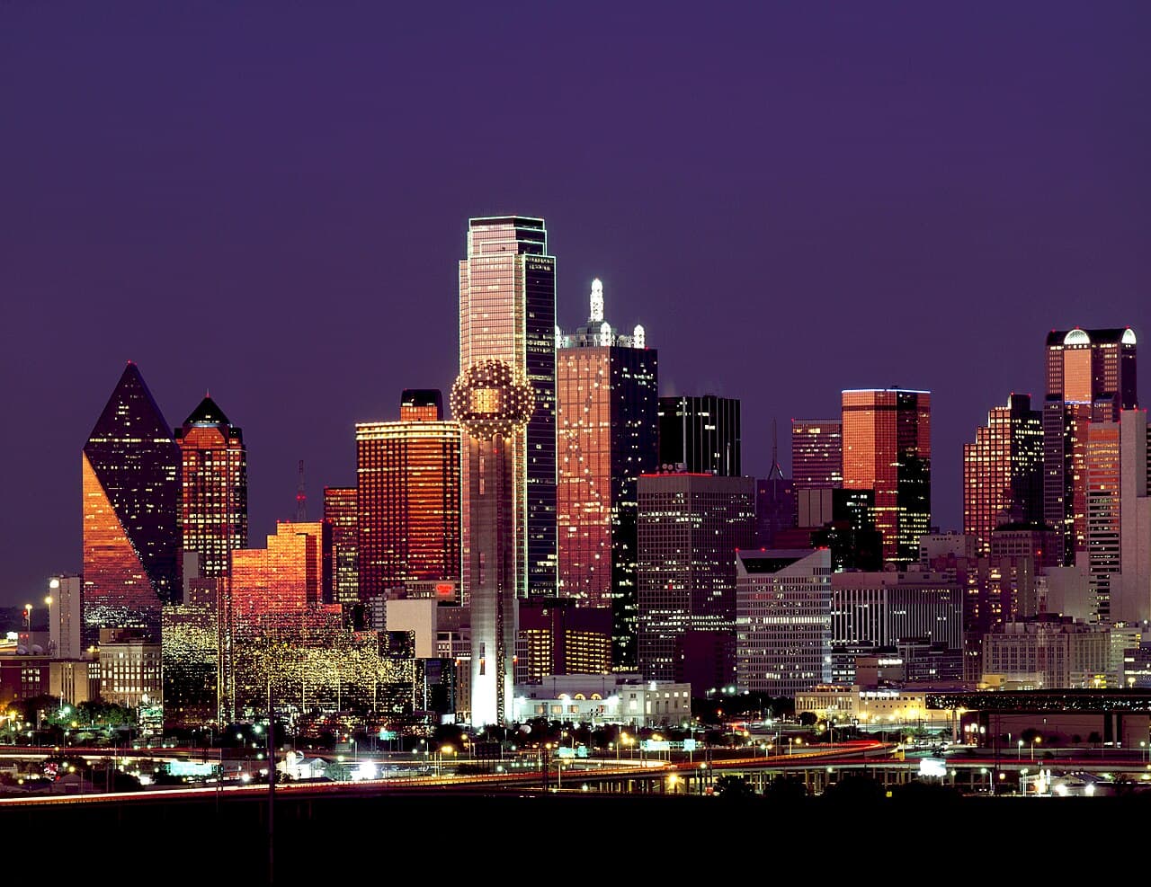 Dallas skyline at dusk with Reunion Tower lit